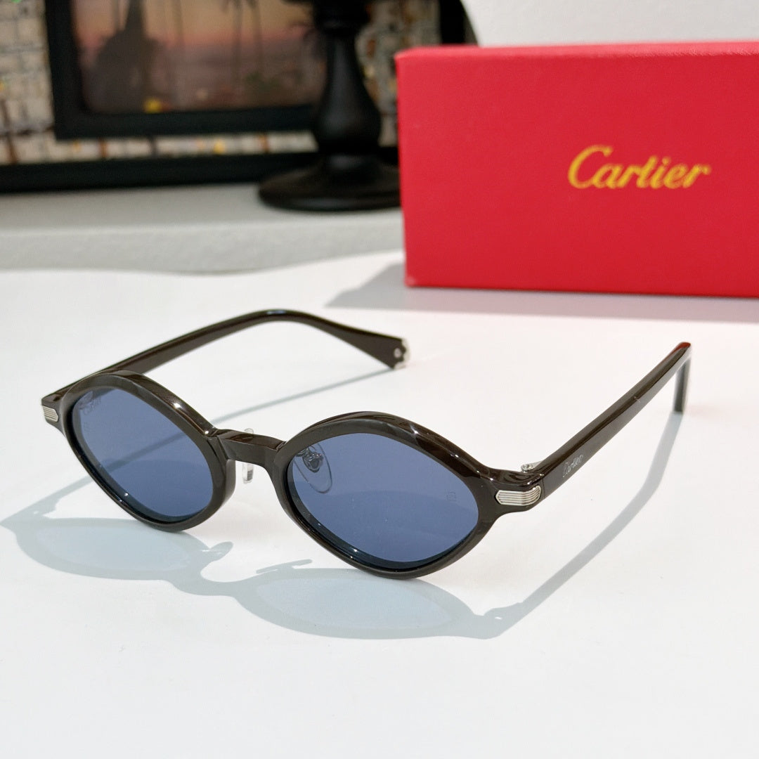 Cartier glasses with dark round frames and blue-tinted lenses