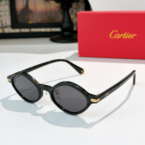 Cartier glasses with black round frames and gold-tone hinges