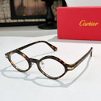 Cartier eyeglasses with tortoise-pattern round frames and gold-tone temples