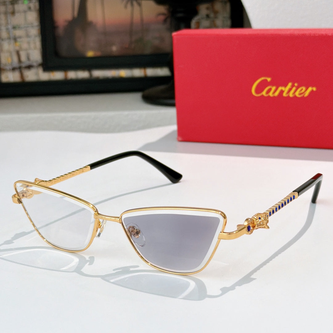 Gold-tone cat-eye eyeglasses with smoky lenses and dark temple tips