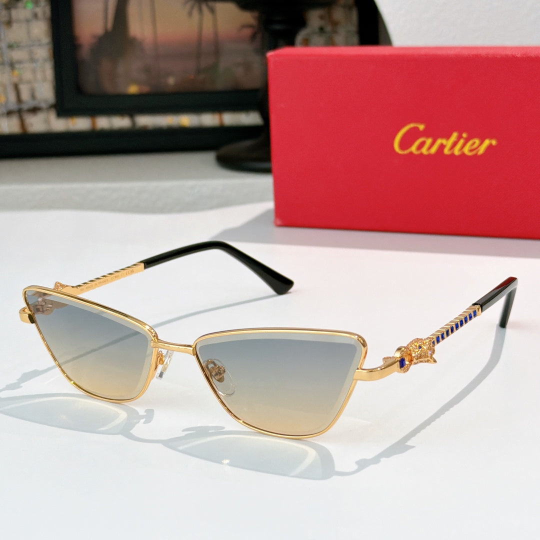 Gold-tone cat-eye eyeglasses with light gray tinted lenses and black temple tips
