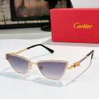 Gold-tone cat-eye eyeglasses with purple tinted lenses and black temple tips