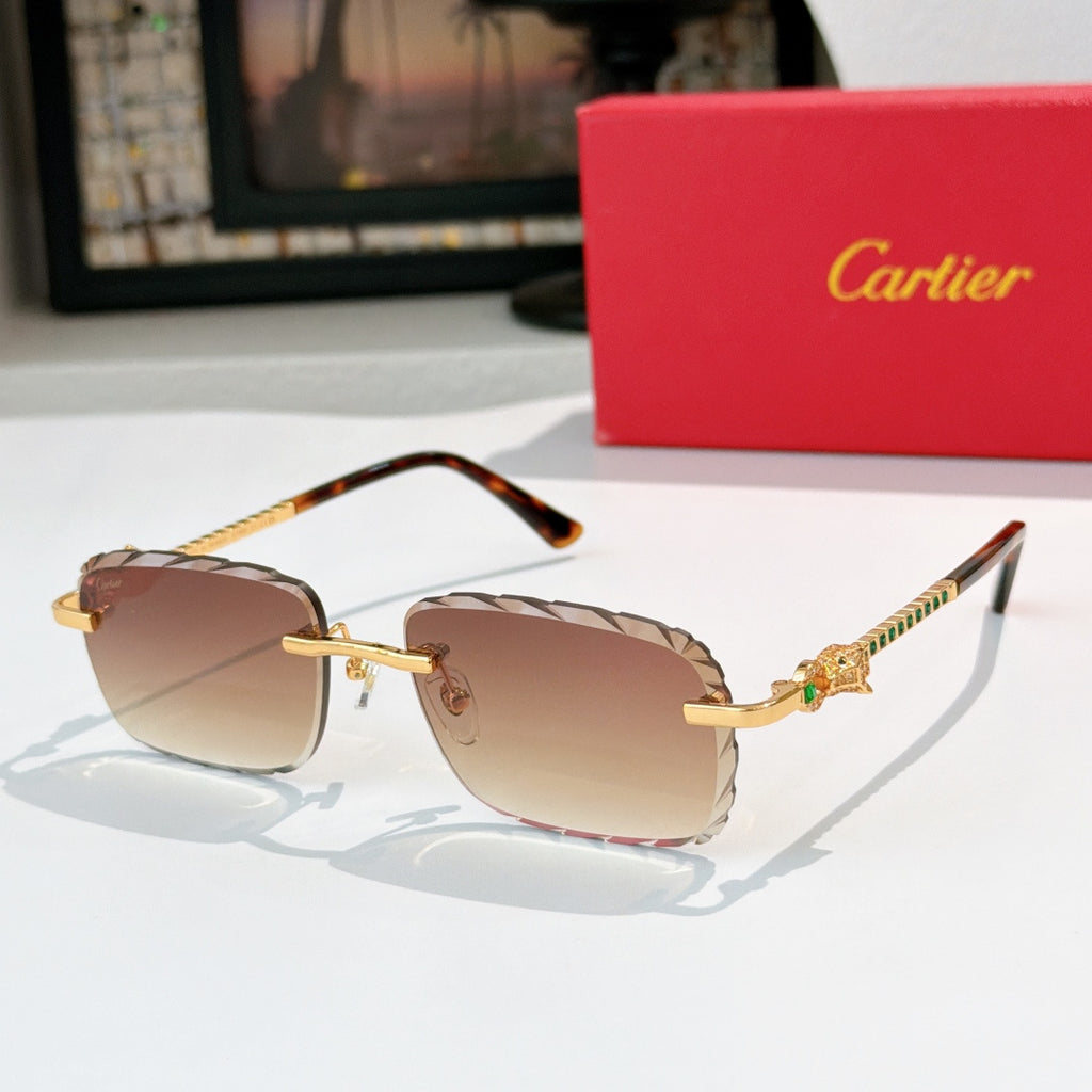 Cartier sunglasses with gold frame and brown tinted lenses, dark temples.