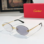 Cartier glasses with round gold metal frame and gray mirrored lenses, black temple tips