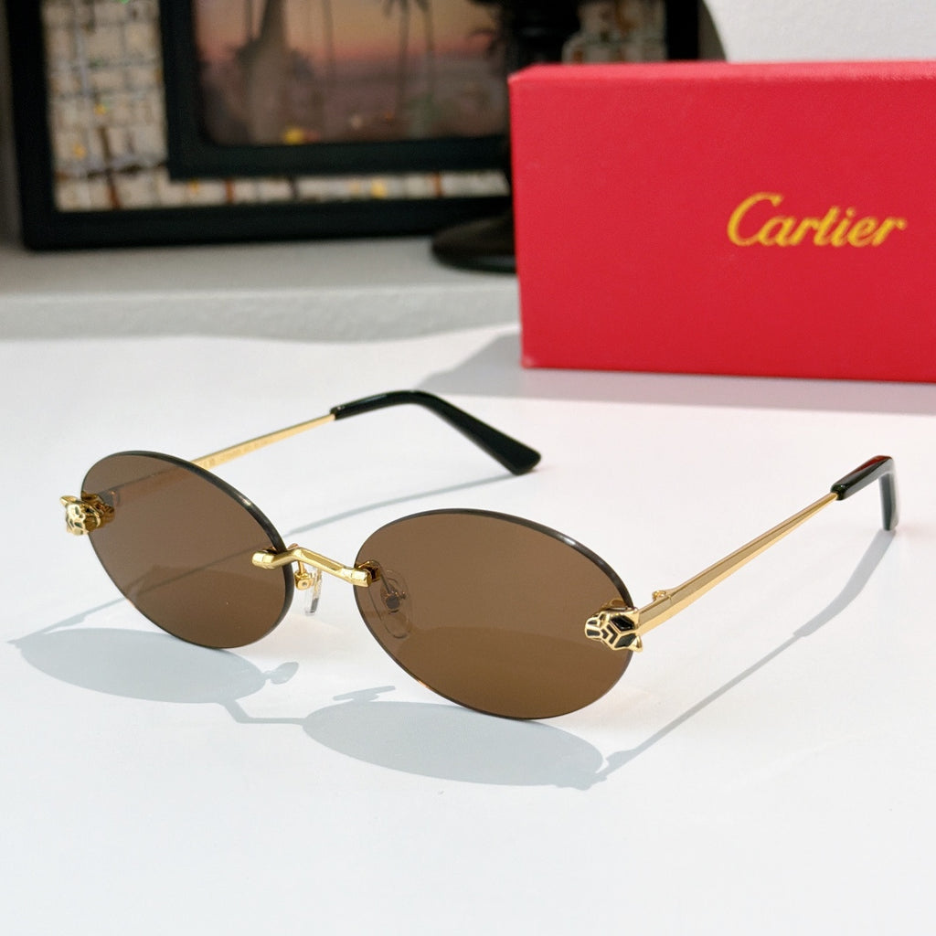 Cartier glasses with round gold metal frame and brown tinted lenses, black temple tips