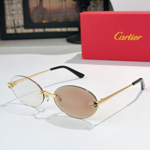 Cartier glasses with round gold metal frame and clear lenses, black temple tips