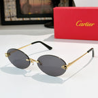 Cartier glasses with round gold metal frame and dark gray lenses, black temple tips