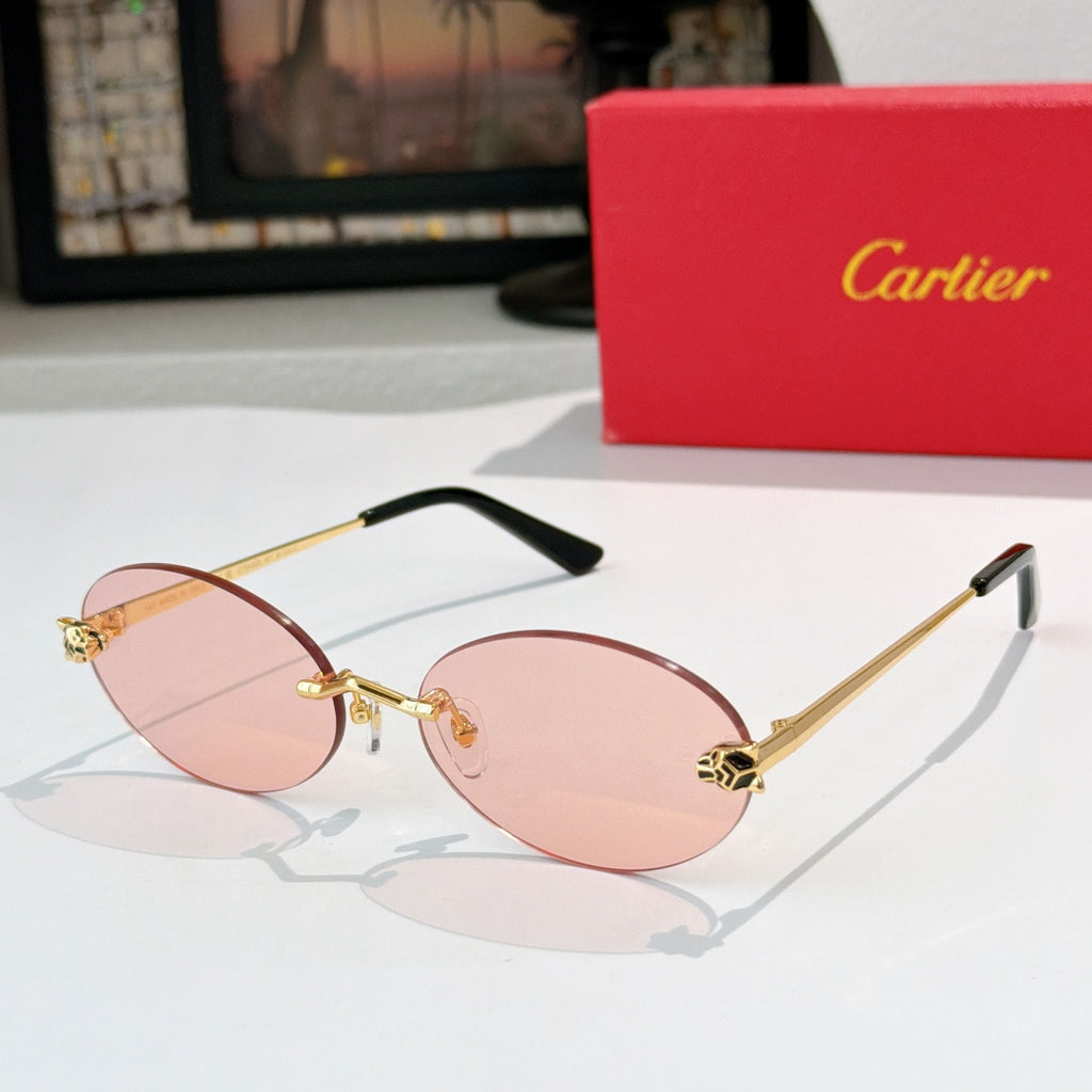 Cartier glasses with round gold metal frame and pink tinted lenses, black temple tips