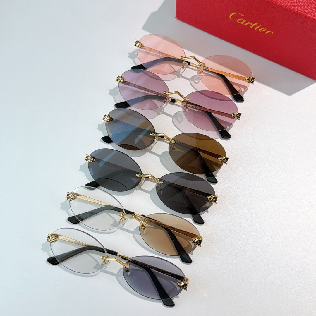 Cartier glasses with round gold frames and assorted tinted lenses in a set