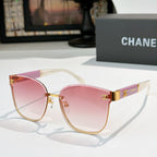 Chanel cat-eye sunglasses with pink tinted lenses, gold-tone frame and clear temples