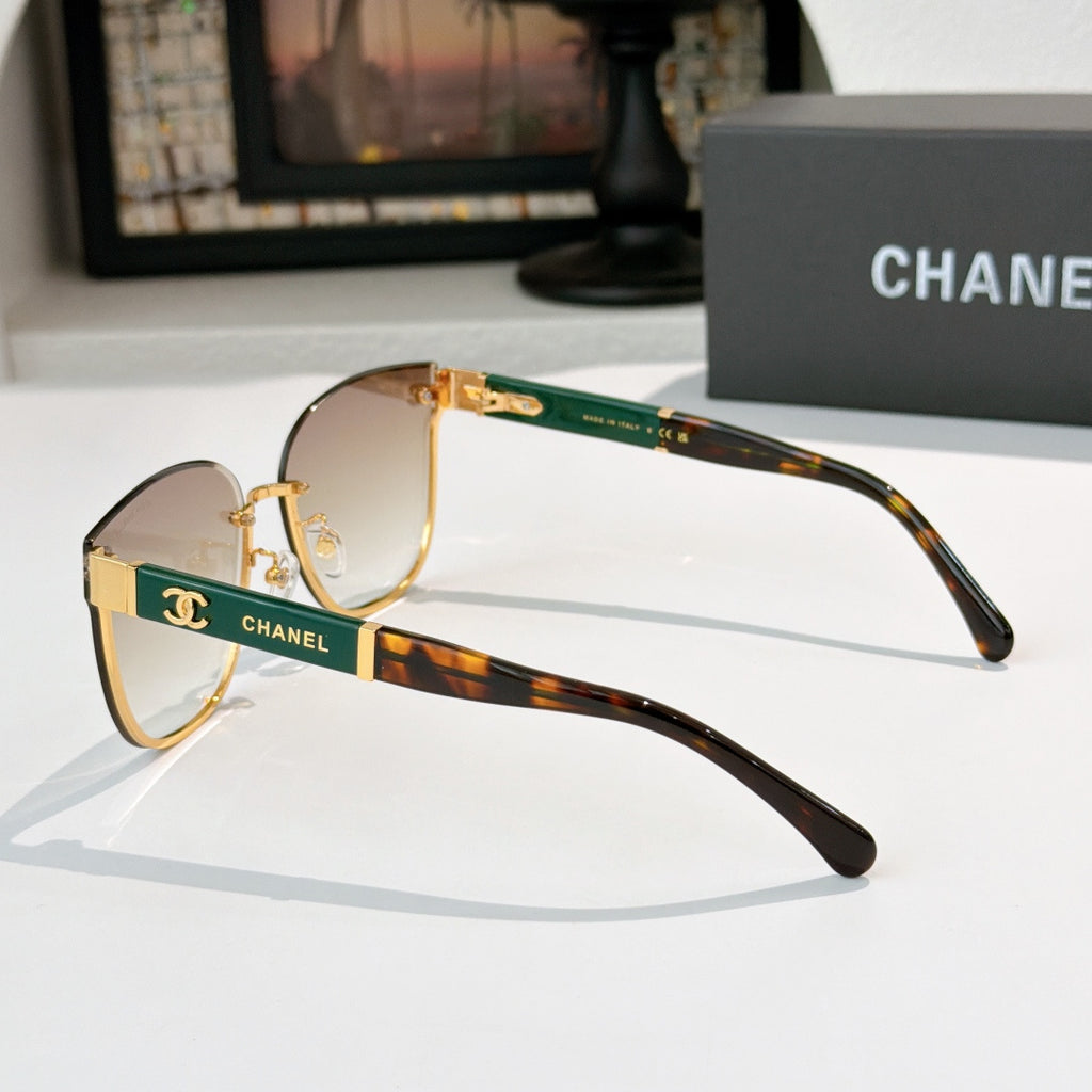 Chanel cat-eye sunglasses side view with brown lenses, gold-tone frame and tortoiseshell temples