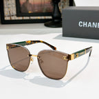 Chanel cat-eye sunglasses with brown lenses, gold-tone frame and tortoiseshell temples