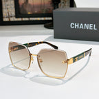 Square cat-eye sunglasses with light brown gradient lenses, gold-tone frame, tortoiseshell temples