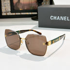 Square cat-eye sunglasses with brown gradient lenses, tortoiseshell temples, gold accents