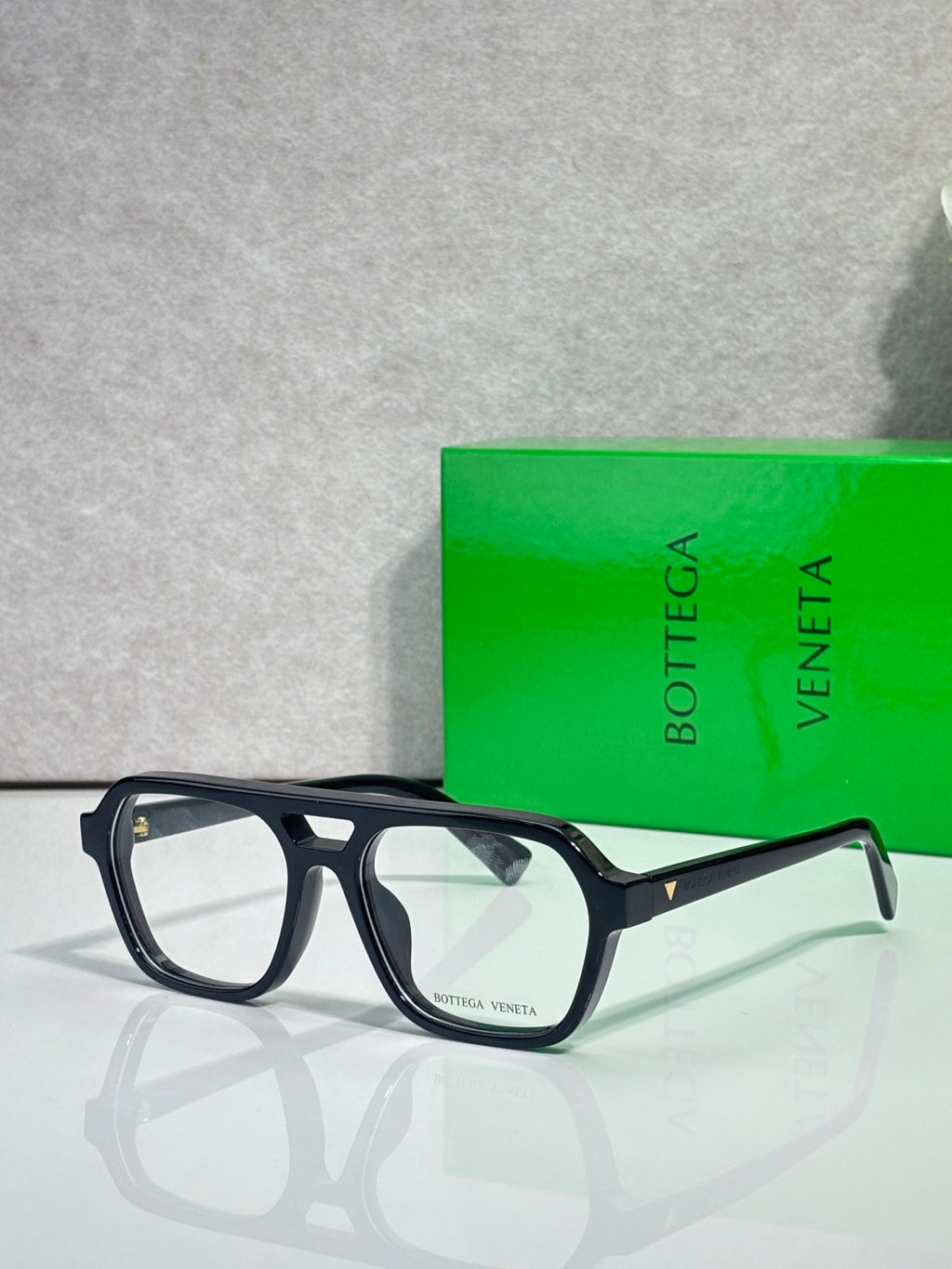 Dark blue rectangular eyeglass frames with clear lenses