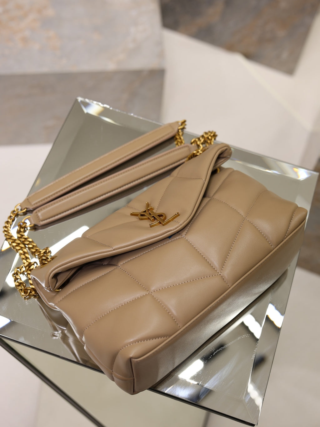 YSL beige quilted shoulder bag with front flap and gold chain strap
