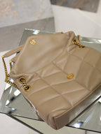 YSL quilted beige shoulder bag with gold button hardware and chain strap