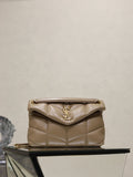 YSL quilted beige bag with flap, YSL logo, and gold chain strap