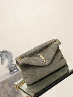Gray YSL shoulder bag with curved flap and YSL logo, gold chain strap