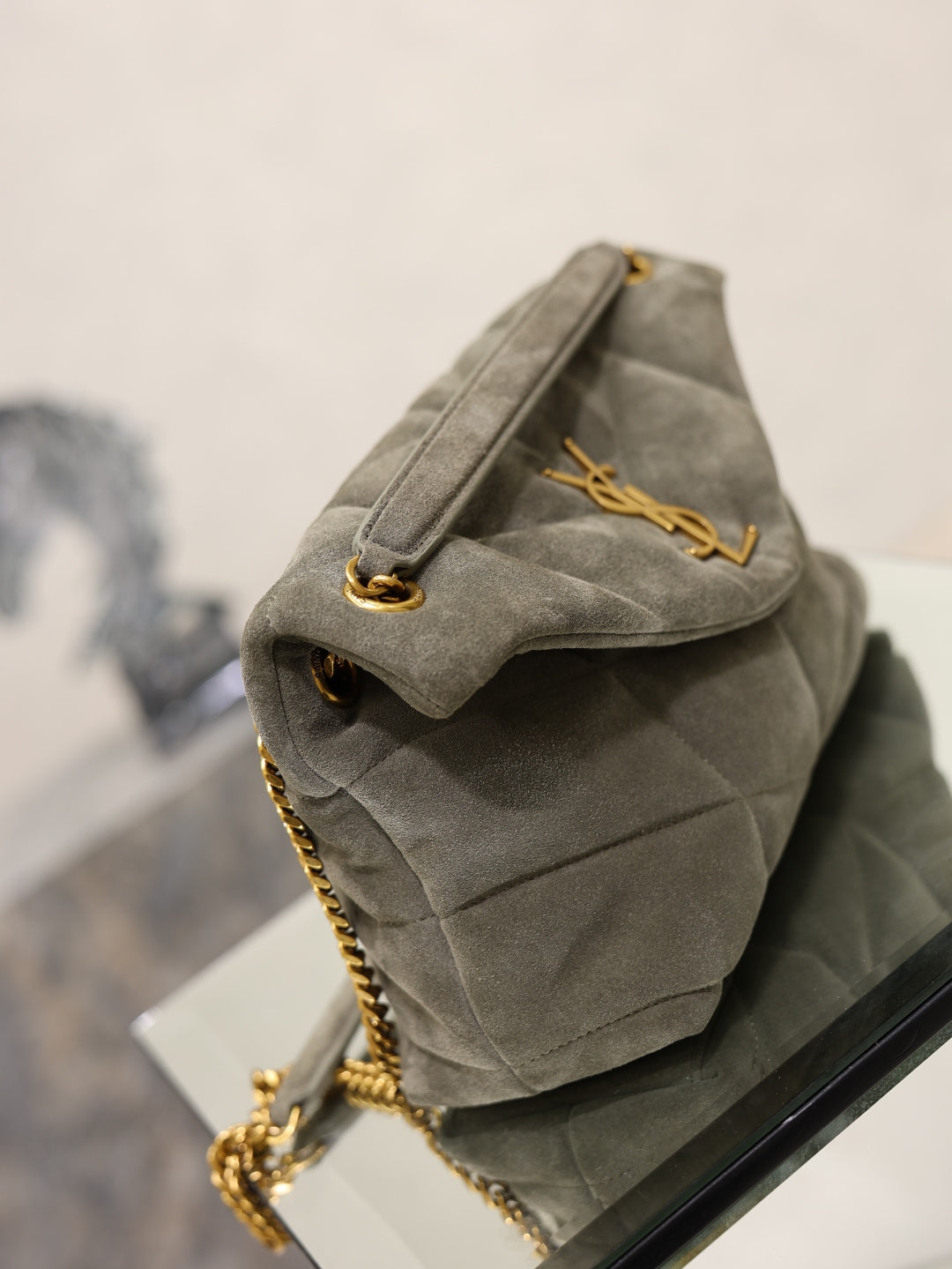 Gray YSL mini shoulder bag with top handle, gold chain strap and flap clasp