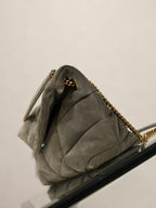 Gray YSL quilted shoulder bag with gold chain strap and clasp, dark lining