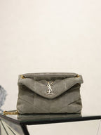 Gray YSL shoulder bag with gold chain strap and YSL logo on flap