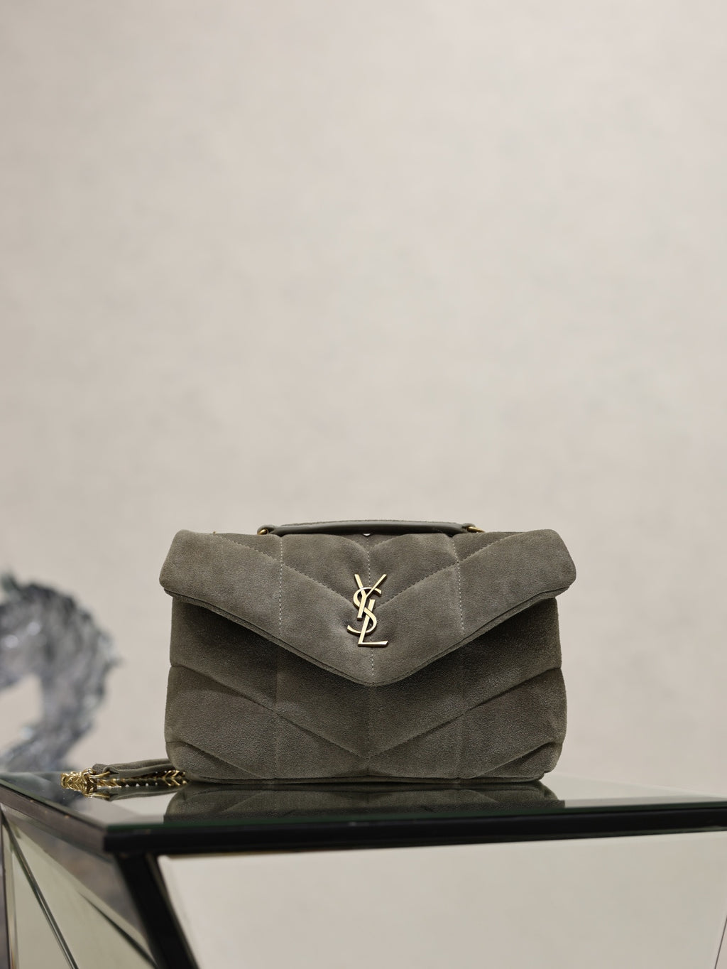 Gray suede shoulder bag with quilted flap, gold YSL logo, chain strap