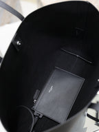 YSL black tote interior with zip pocket and card slot panel