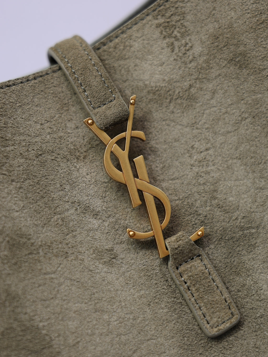 YSL bag in olive suede with gold YSL logo zipper pull detail
