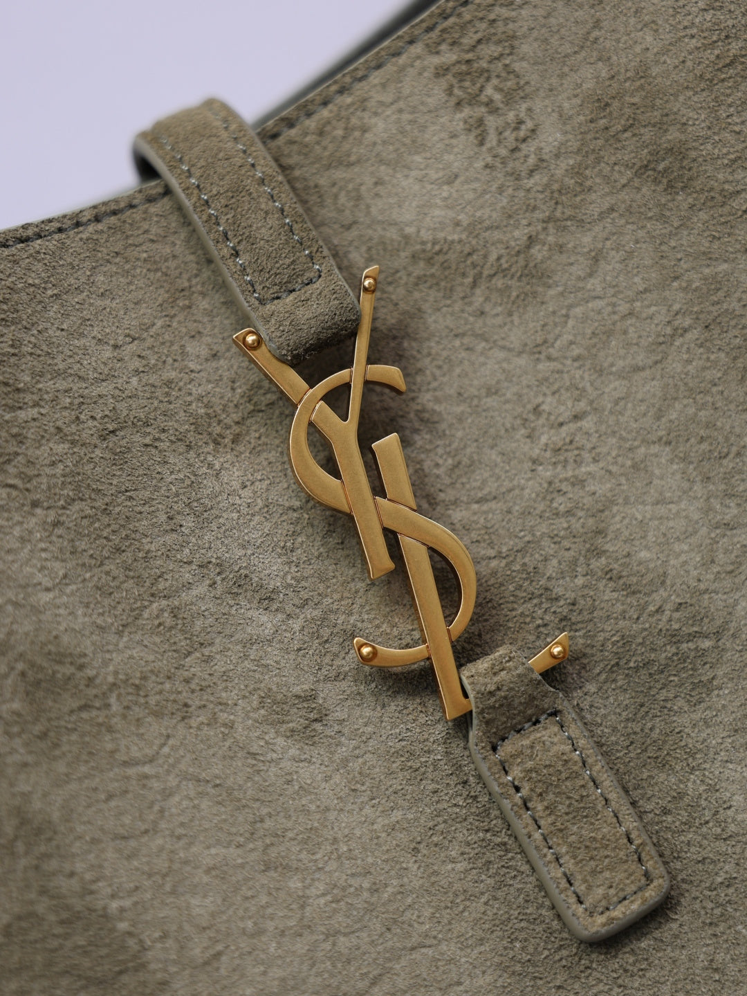 YSL bag in olive suede with gold YSL logo zipper pull detail