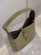 YSL bag in olive suede with open top and black interior lining