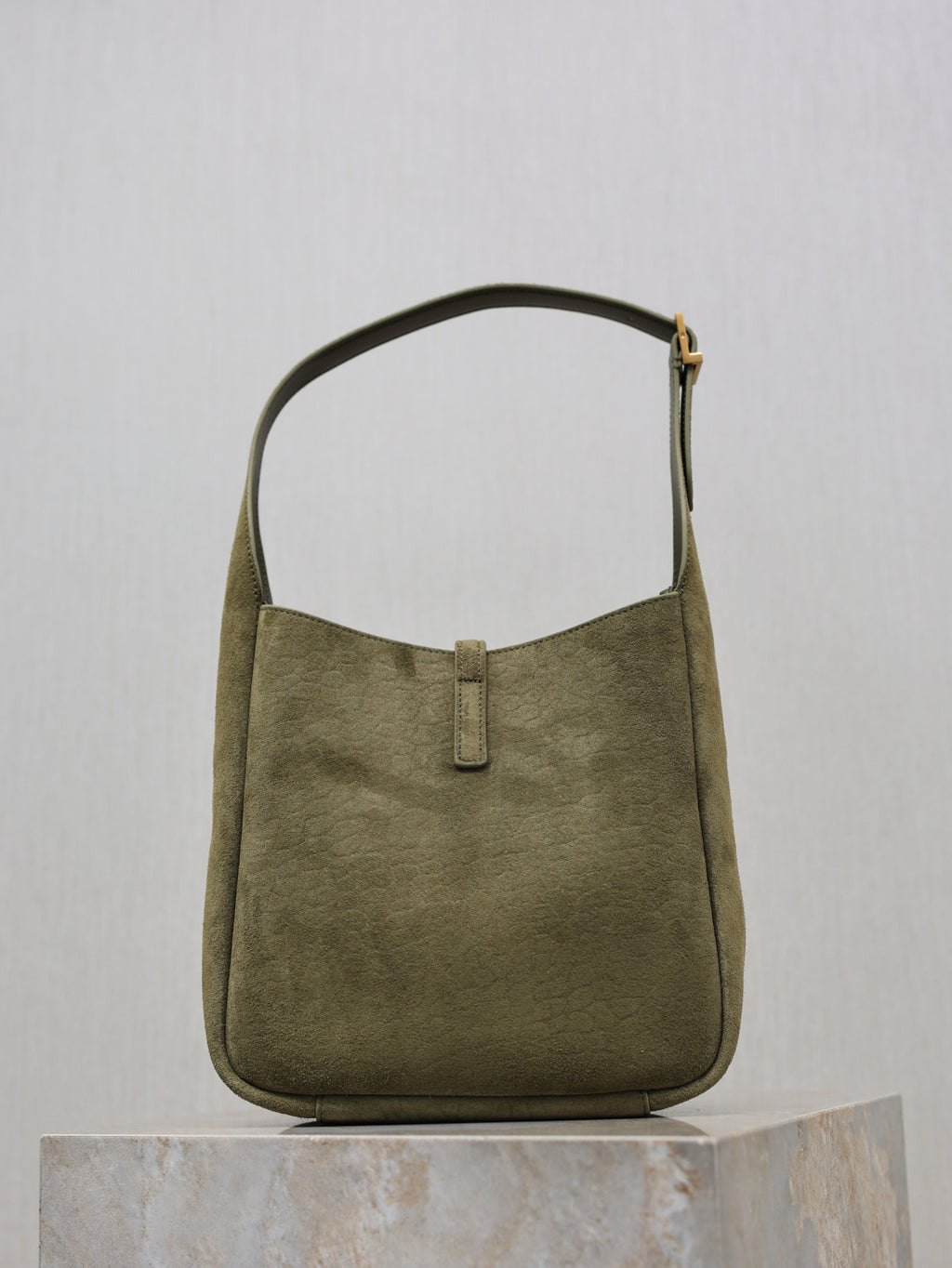 YSL bag in olive suede with top handle and front closure strap