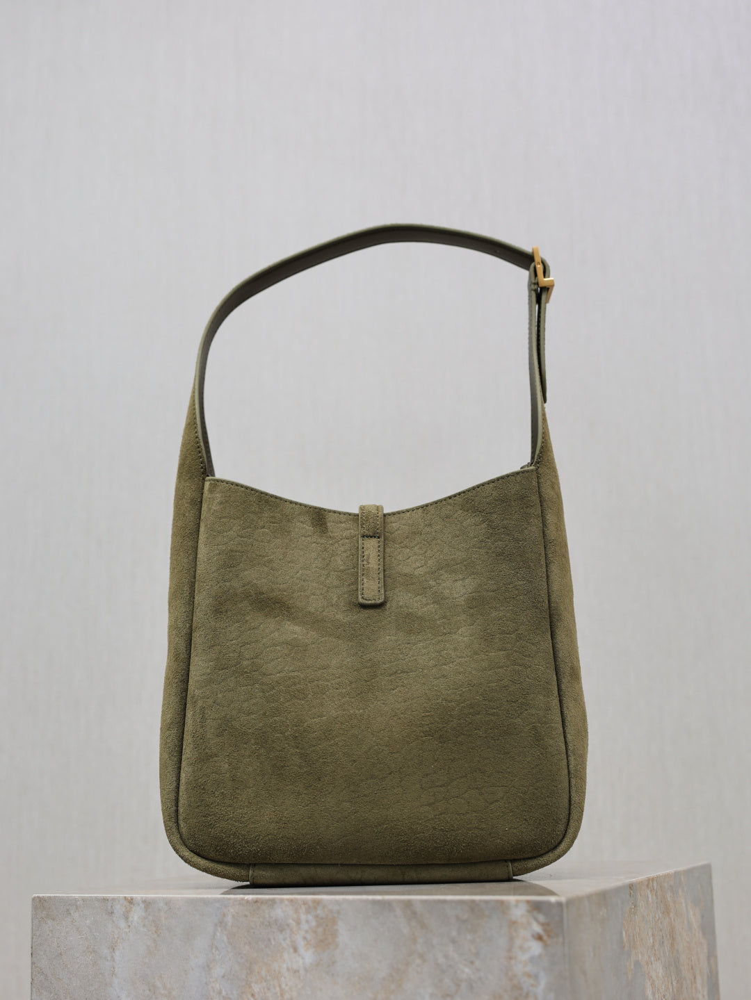 YSL bag in olive suede with top handle and front closure strap