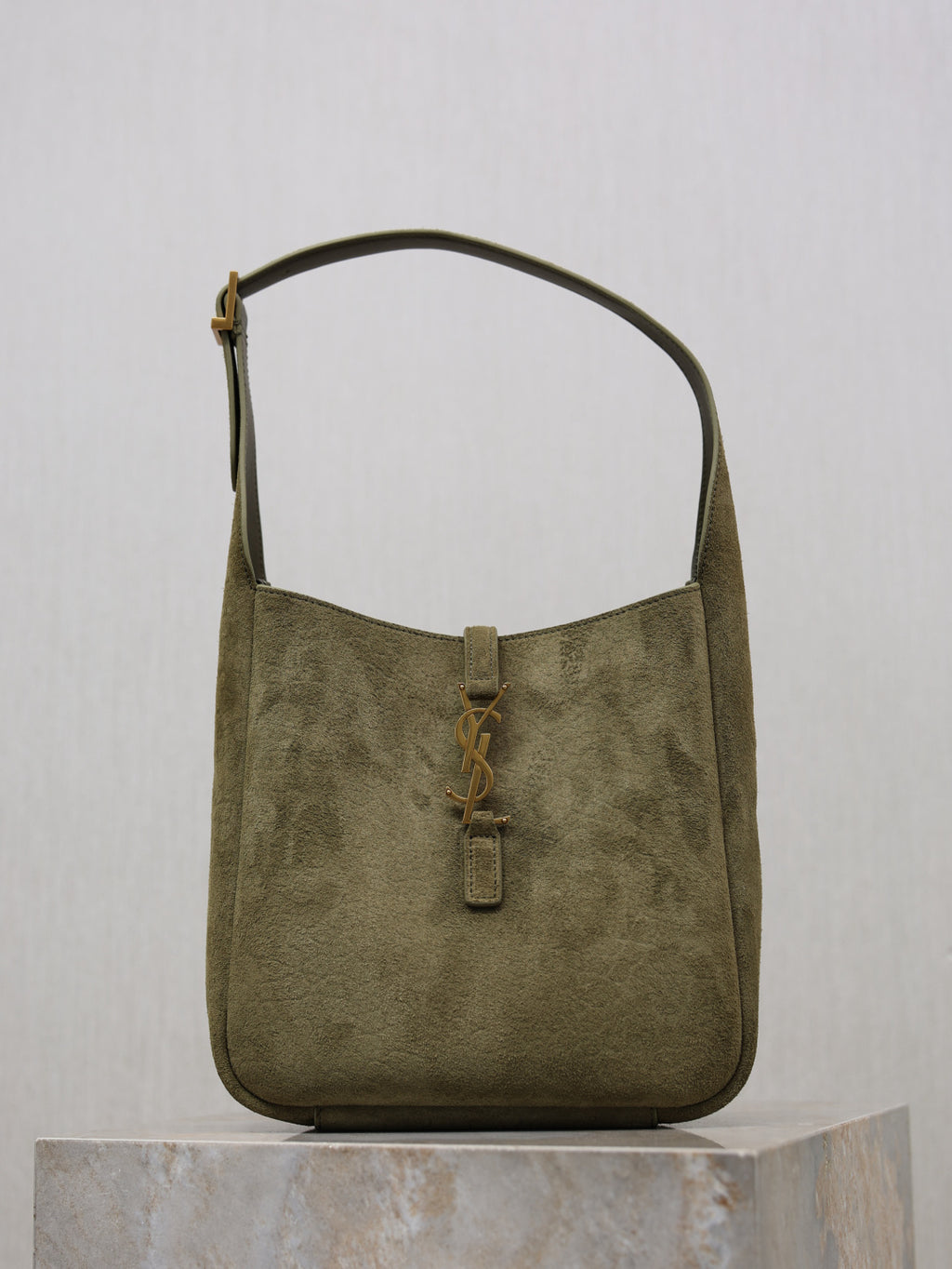 YSL bag in olive suede with top handle and front YSL zipper pull