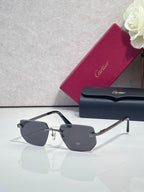 Cartier glasses with dark frames and gold temples, angled view of brown tinted lenses