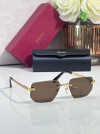 Cartier glasses with gold temples and brown tinted lenses, front view