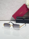 Cartier eyeglasses with dark frame, gold-tone metal, and gray gradient lenses
