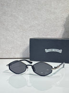 Metal round sunglasses with black frame and dark gray lenses