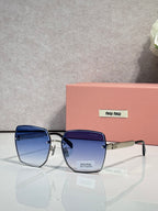 MiuMiu square blue glasses with dark blue tinted lenses and gold-tone hinges