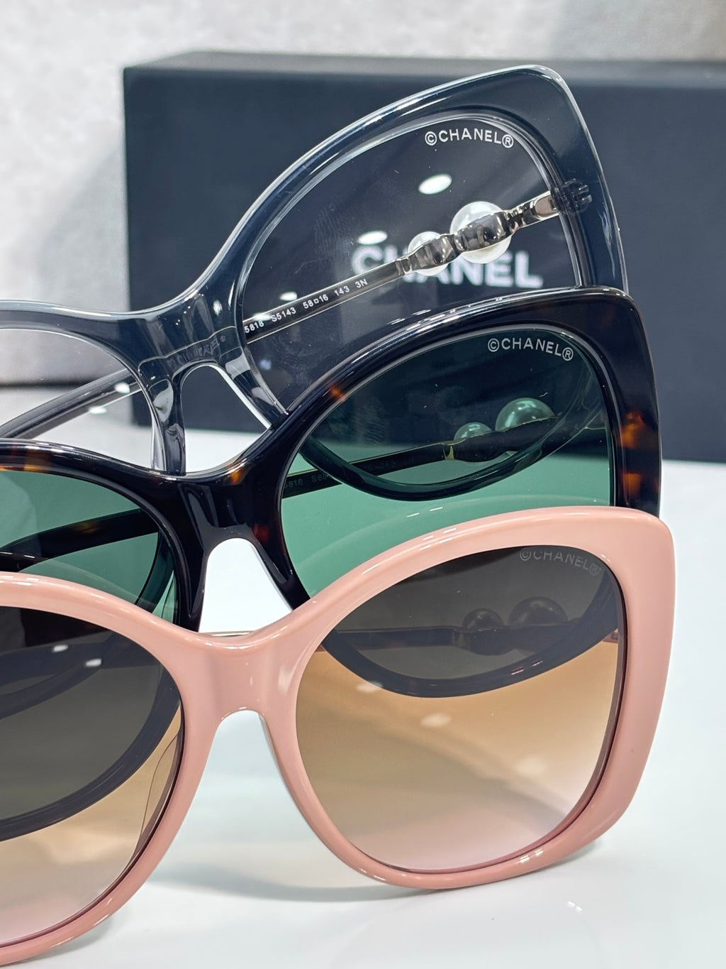 Chanel glasses with two-tone frames, pink and dark blue, tinted lenses