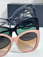 Chanel glasses with two-tone frames, pink and dark blue, tinted lenses