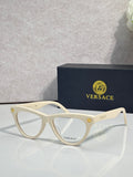Versace optical glasses, white frame with gold logo accents, clear lenses.
