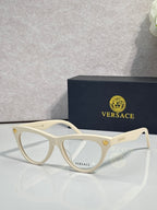Versace optical glasses, white frame with gold logo accents, clear lenses.