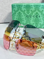 Sunglasses with gold frame and mixed green, amber, and pink-tinted lenses