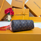 Louis Vuitton monogram duffel-style bag in dark blue with red shoulder strap