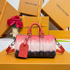 Louis Vuitton monogram handbag in pink-to-brown gradient with top handles and shoulder strap