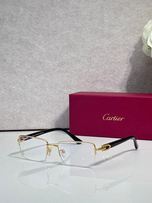 Cartier glasses with gold frame and clear rectangular lenses, dark blue accents