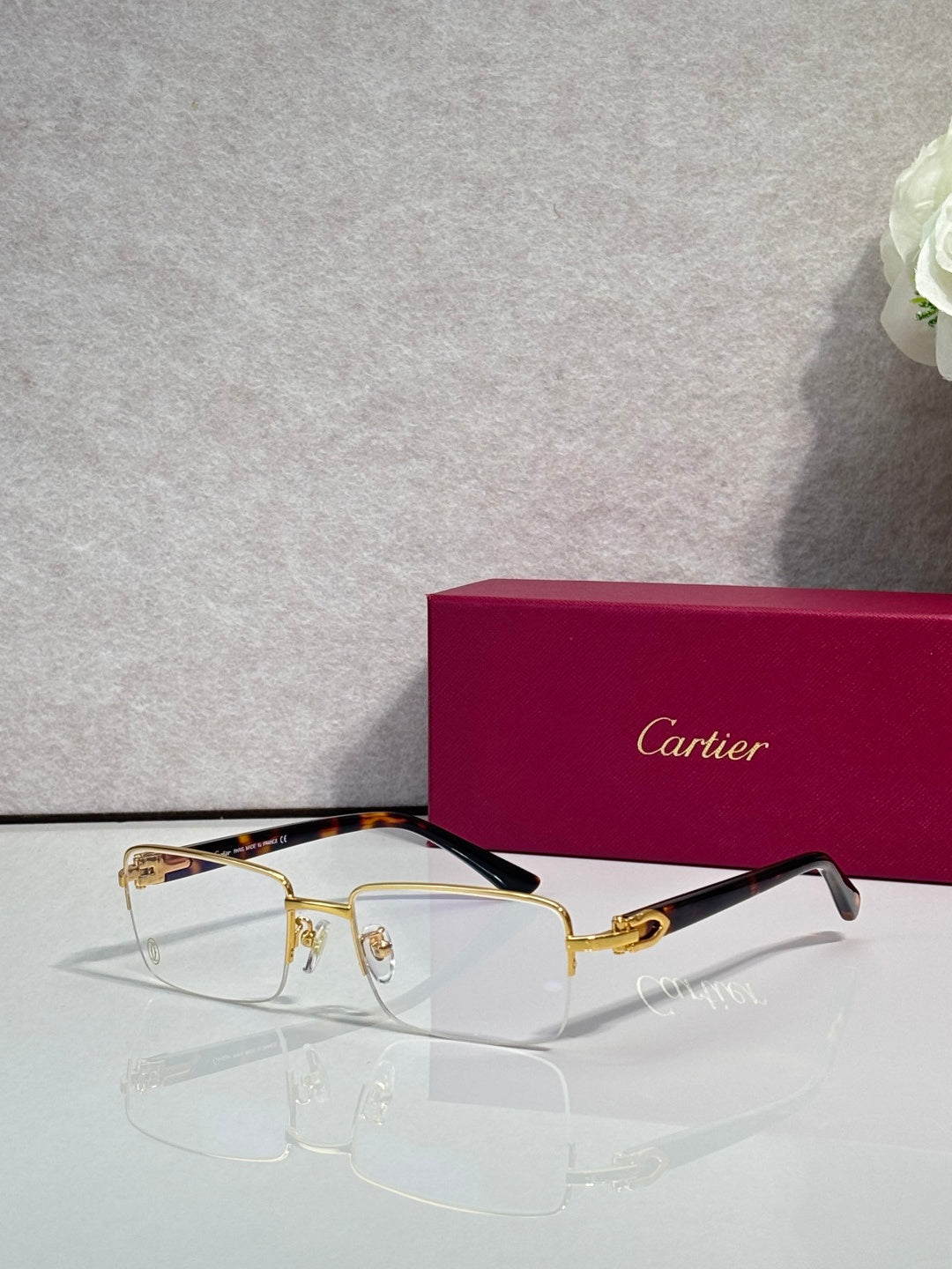 Cartier glasses with gold and tortoiseshell frame, clear rectangular lenses