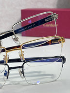 Cartier glasses with dark blue and tortoiseshell accents, clear rectangular lenses