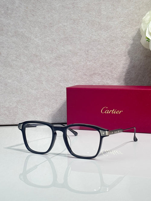 Blue rectangular eyeglasses with clear lenses and gold accents